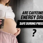 A selection of healthy, caffeine-free energy drinks suitable for pregnant women, shown on a clean kitchen counter with natural ingredients like fruits and herbs.